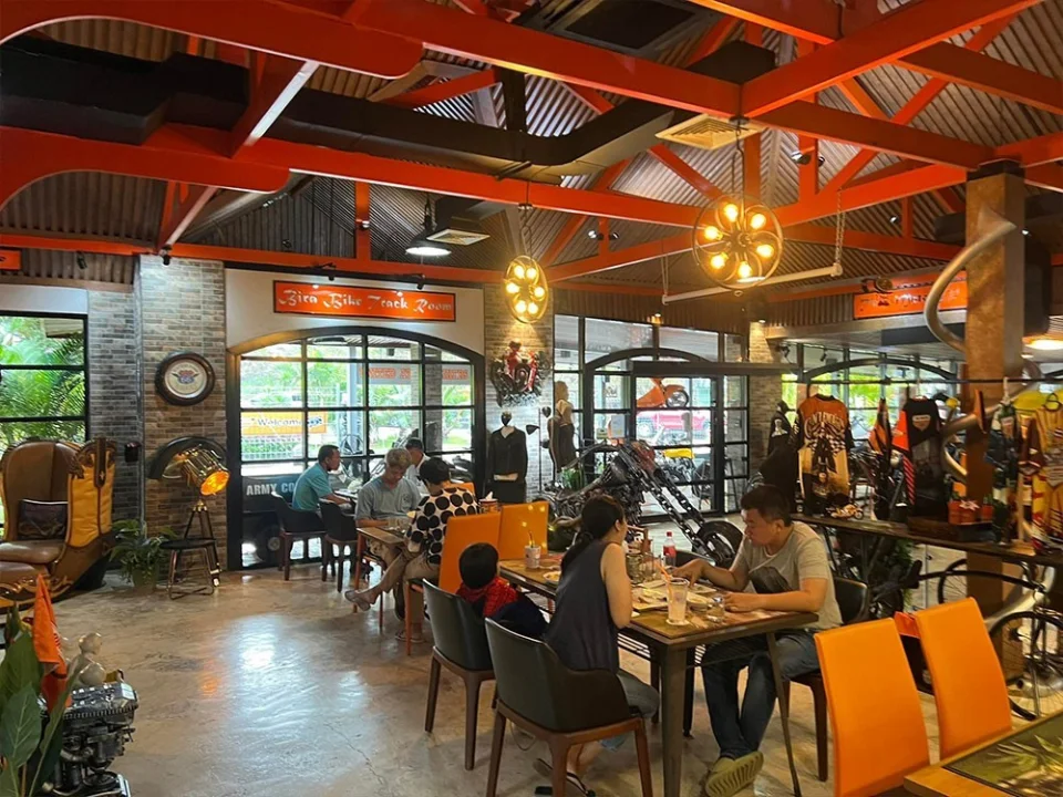 Groups at the tables of The Bikers Café
