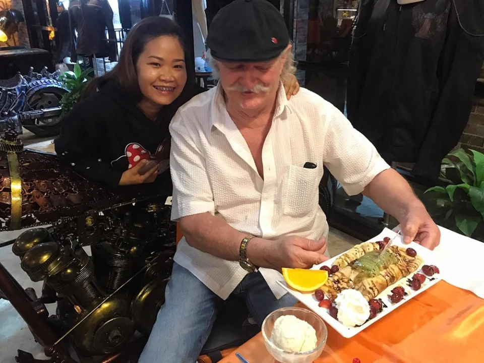 Guests with a platter of food