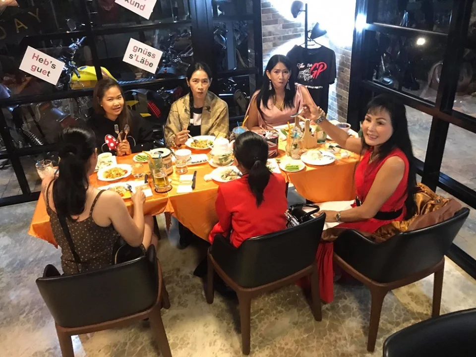 A family dinner inside the café
